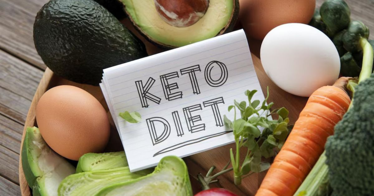 Healthy keto diet foods including avocado, eggs, vegetables, and herbs.